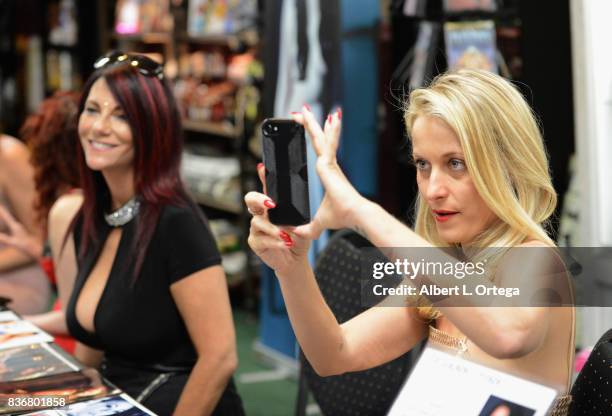 Actresses Max Wasa and Sadie Katz participate in the "Hotness Of Horror" - A Special Scream Queen Signing Event held at Dark Delicacies Bookstore on...