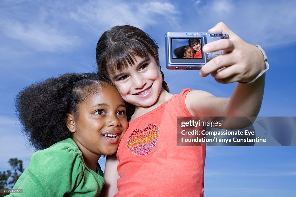 Best friends taking photos