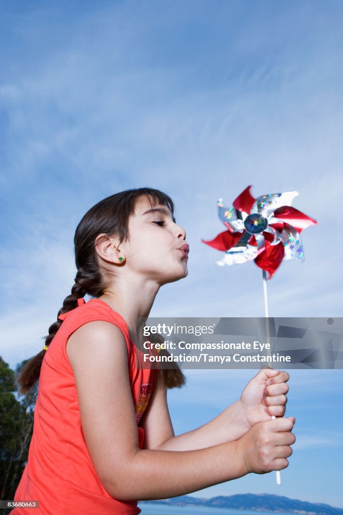 Little girl with pin wheel