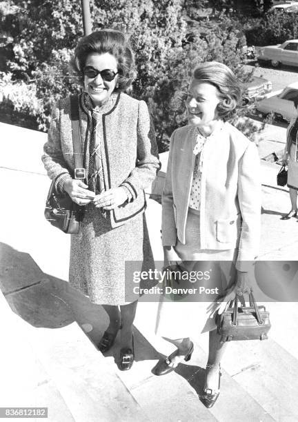 Mrs. George Wilfley, left, and Mrs. William Wilbur are season ticket holders for the Town Hall Lecture series sponsored by Polly Grimes at Phipps...