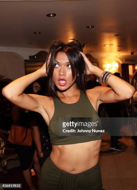 Recording artist/ model Ashley Martinez backstage after her performance on August 21, 2017 in New York City.
