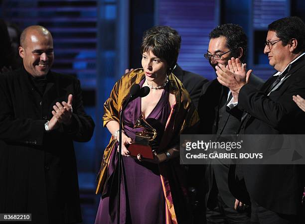 Members of the Orquestra Filarmonica di Bogota accept the Grammy for the Best Instrumental album during the 9th Annual Latin Grammy Awards held on...