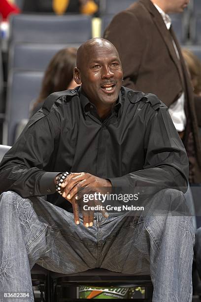 Charlotte Bobcats managing member of basketball operations Michael Jordan sitting courtside in stands during game vs New Orleans Hornets. Charlotte,...