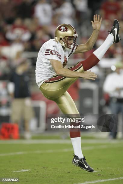 Punter Andy Lee of the San Francisco 49ers punts the ball during the NFL game against the Arizona Cardinals at University of Phoenix Stadium on...