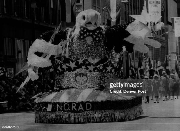 Parades - Denver Warlike Yet Friendly - Looking Eagle was on Norad Float Dressed in Bicentennial best, bird moved from side to side for all to see....
