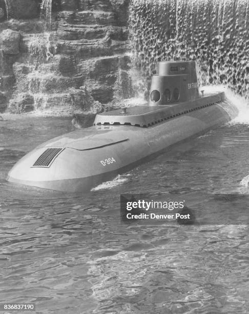 To Perform for Carriers The "Skipjack," one of eight Disneyland Submarines named after America's nuclear powered undersea fleet, breaks through a...