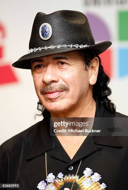 Musician Carlos Santana poses in the press room at the 9th annual Latin GRAMMY awards held at the Toyota Center on November 13, 2008 in Houston,...