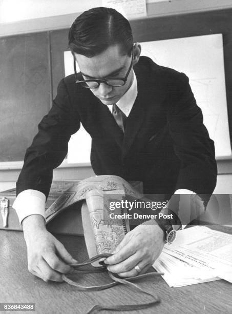 Jefferson County Co - Adult Ed David Shrum, 4390 Gray St., prepares to show a fancy handmade belt and holster set. Credit: Denver Post