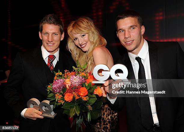 Bastian Schweinsteiger, Marta Cecchetto and Lukas Podolski attend the afterparty for the 2008 GQ Men of the Year Award on November 13, 2008 in...