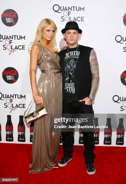 Benji Madden and Paris Hilton arrive at the pre-screening of "Bond 007: Quantum Of Solace" on November 13, 2008 in Los Angeles, California.