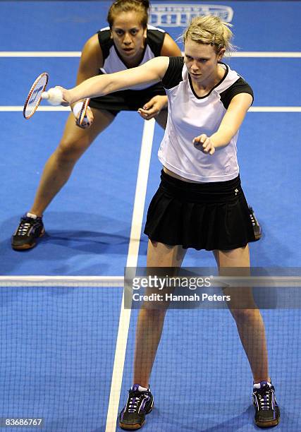 Rachel Hindley of New Zealand plays a shot as her partner Renee Flavell of New Zealand looks on during their Women's Doubles Semi Finals match...
