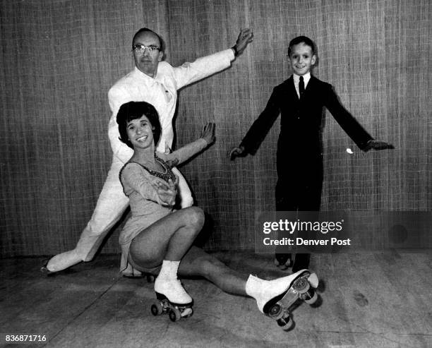 Three Big Wheels On Twenty-Four Little Wheels Roller-Skate champions Jim, left, Doris and Richard Giardini on home rink. Giardini, Jim & Doris spts...