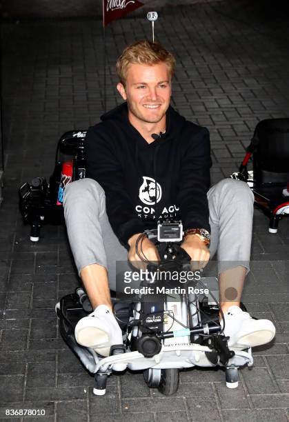 Former Formula One Worldchampion Nico Rosberg of Germany in action during the viva con aqua social e-cart race at Millerntor Stadium on August 22,...