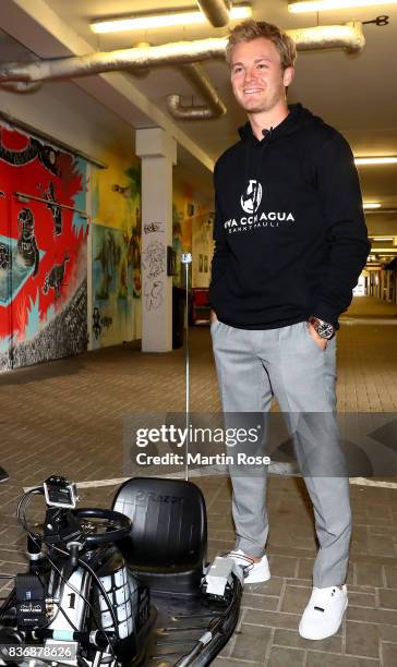 Former Formula One Worldchampion Nico Rosberg of Germany looks on before the viva con aqua social e-cart race at Millerntor Stadium on August 22,...