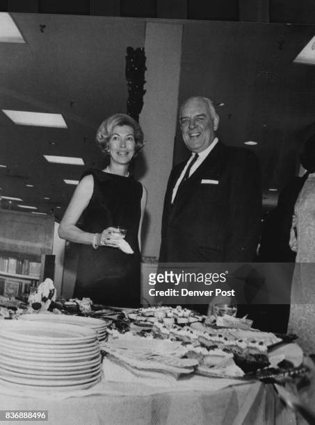 Shrimp, Crab, Lobster and Caviar are guest fare Mr. And Mrs. Jack Manning pause at buffet table Sunday during party for patron supporters of...