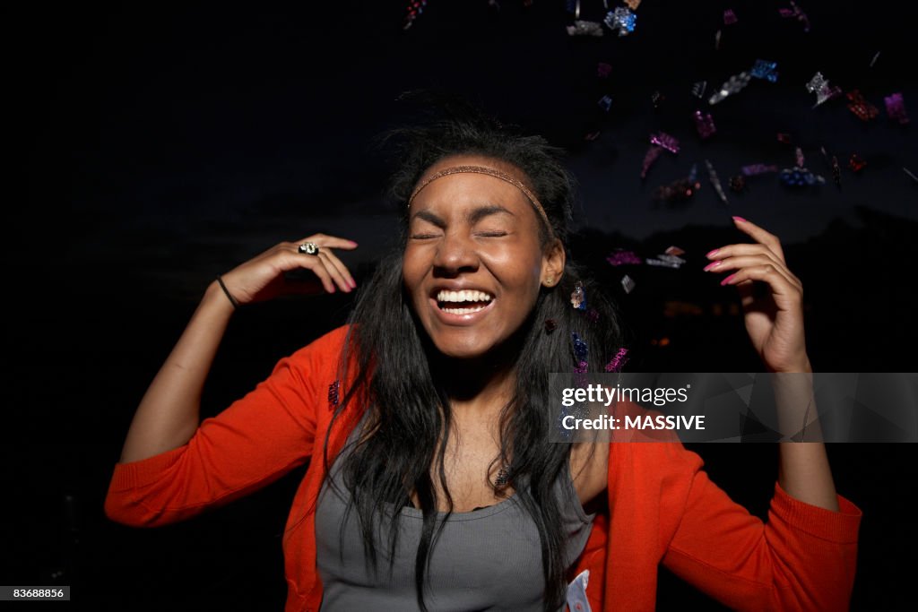 Confetti falls on girl