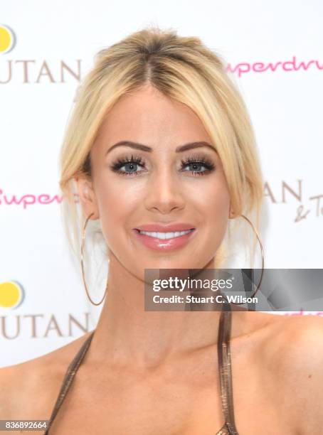 Olivia Attwood celebrates the nationwide launch of 'UTan & Tone' into Superdrug stores at Superdrug, Westfield White City on August 22, 2017 in...