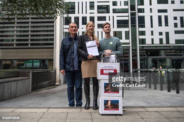 John Tyson , the founder of a petition to bring in fire safety regulations to make Britain's tower blocks safer, poses for a photograph with Sian...