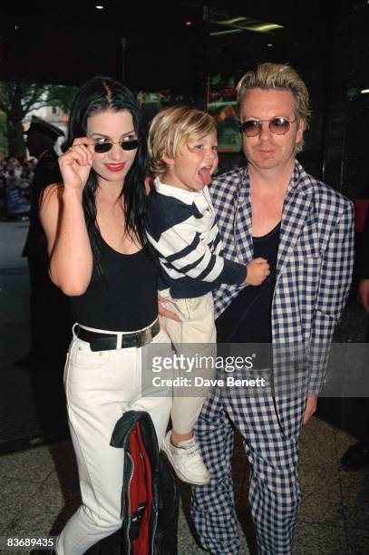 Dave Stewart and Siobhan Fahey with their son Sam at the London premiere of 'Wayne's World', 21st May 1992.