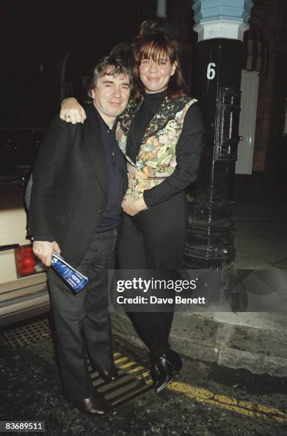 Actor, comedian and pianist Dudley Moore with his wife Brogan Lane, November 1990.