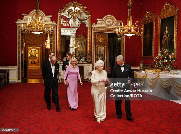 Prince Charles, Prince of Wales and Queen Elizabeth ll, followed by Prince Philip, Duke of Edinburgh, Camilla, Duchess of Cornwall, Prince William...