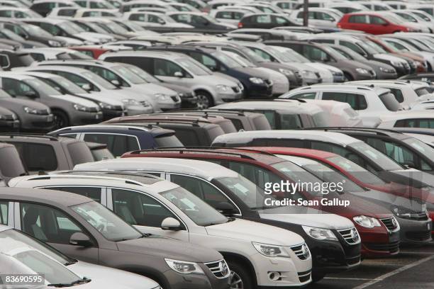 New VW cars wait to get loaded onto trucks at the Volkswagen car factory on November 14, 2008 in Wolfsburg, Germany. Many European carmakers are...