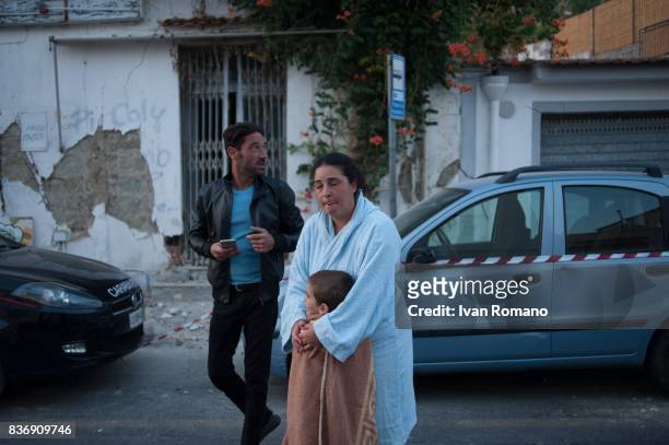 People leave Casamicciola, the area most affected by the earthquake, on August 22, 2017 in Casamicciola Terme, Italy. A magnitude-4.0 earthquake...
