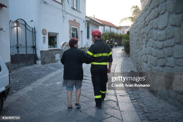 People leave Casamicciola, the area most affected by the earthquake, on August 22, 2017 in Casamicciola Terme, Italy. A magnitude-4.0 earthquake...