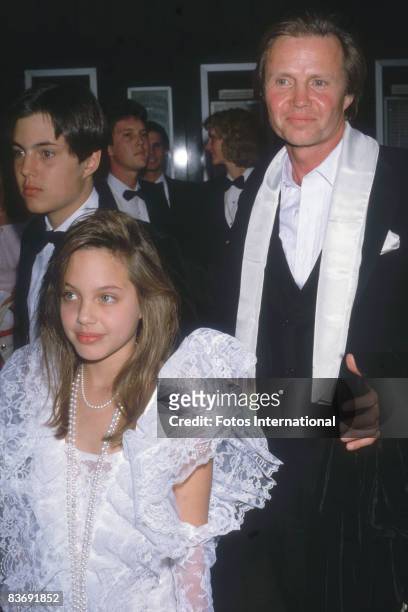 American actor Jon Voight attends the Academy Awards with his son James Haven Voight and daughter Angelina Jolie Voight, at the Dorothy Chandler...