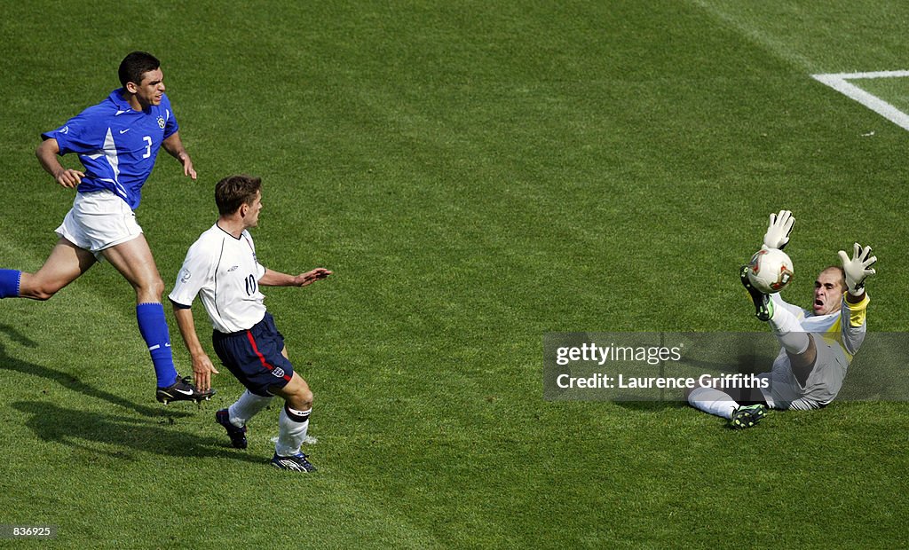 Michael Owen of England scores the opening goal of the match