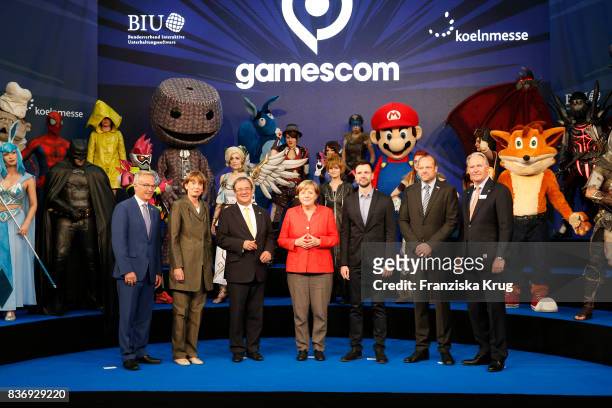 Sean Casey, Henriette Reker, Armin Laschet, Felix Falk, Tobias Haar and Gerald Boese welcome German Chancellor Angela Merkel at the Gamescom 2017...