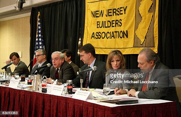 Treasurer Michael Karmatz addresses the audience while 2007/2008 NJBA President Barry Solondz , NJBA Executive VP Tim Touchey, VP and 2008/2009 NJBA...