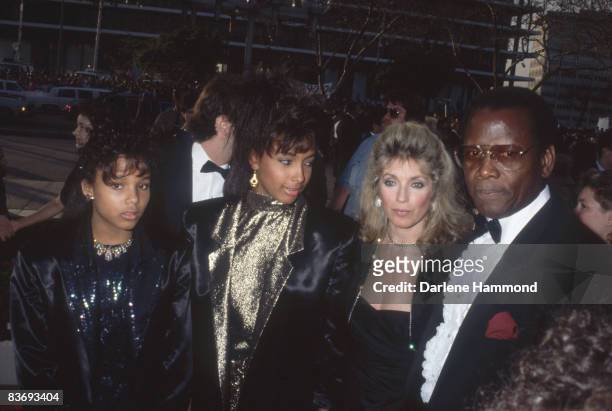 American-born Bahamania actor Sidney Poitier and his family, wife Joanna and daughters Sydney and Anika, attend the Academy Awards at the Dorothy...