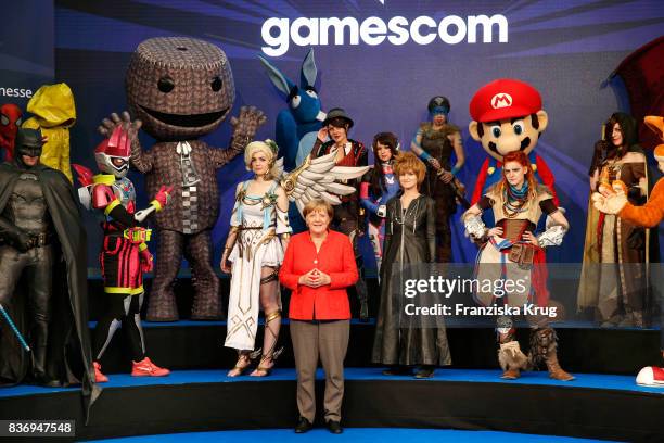 German Chancellor Angela Merkel opens the Gamescom 2017 gaming trade fair during the media day on August 22, 2017 in Cologne, Germany. Gamescom is...