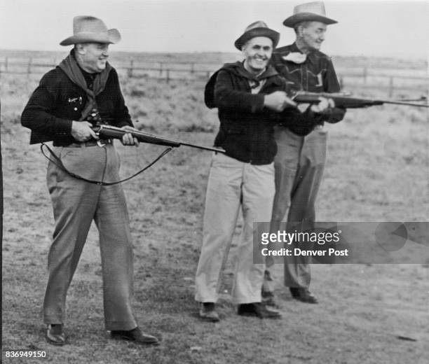 Ready To Lead their respective teams into the field for the "one-shot" antelope hunt at Lander, Wyo., are Gov. Lester C. Hunt of Wyoming; Gov. Robert...