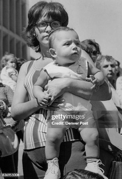 Mrs. Robert Garcia and her son, Chris take in the entertainment outside KMGH-TV studios during Jerry Lewis Muscular Dystrophy Telethon. Credit:...
