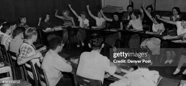 Skinner high school Parents watch and listen in the background as the junior high man relations. Judging by the display of hands, the girls school...