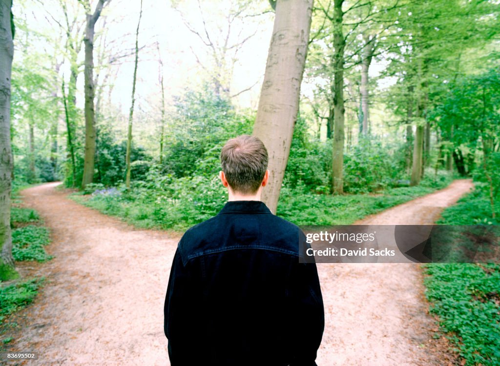 Man at crossroads