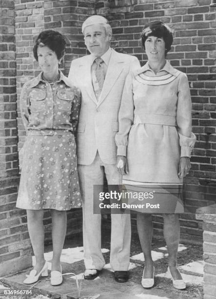 Morton Miller, president of the hospital, is flanked by Mrs. Gary Antonoff, left, the outgoing president of the women's division, and Mrs. Sheldon...