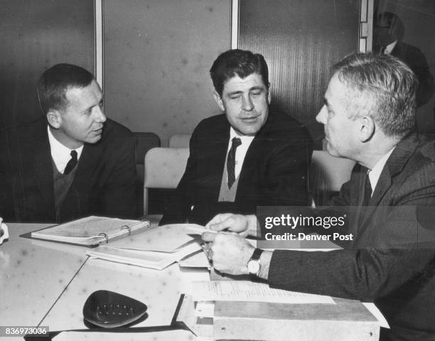 Regents, President Listen to word Battle over firing Left to right are Regents Philip A. Danielson and Dr. Dale W. Atkins, and President Quigg Newton...