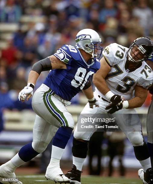 Seattle Seahawks defensive tackle Chad Eaton takes on Jacksonville Jaguars center Jeff Smith during a 24-15 Seahawks victory on October 7 at Husky...