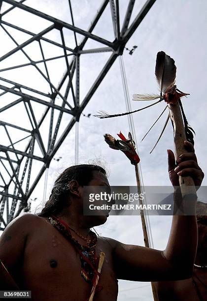 An indigenous man crosses the Bridge of the Americas during the final stage of the Peace and Dignity Journey in Panama City on November 14, 2008. The...