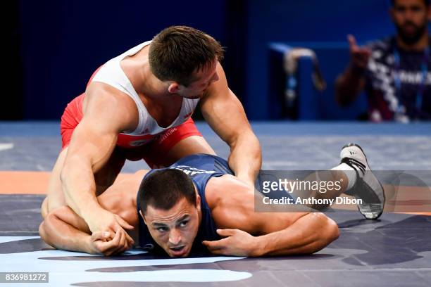 Wagner of Austria and A Gharbi of France during the Men's 80 Kg Greco-Roman competition during the Paris 2017 World Championships at AccorHotels...
