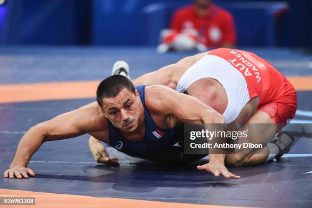 Wagner of Austria and A Gharbi of France during the Men's 80 Kg Greco-Roman competition during the Paris 2017 World Championships at AccorHotels...