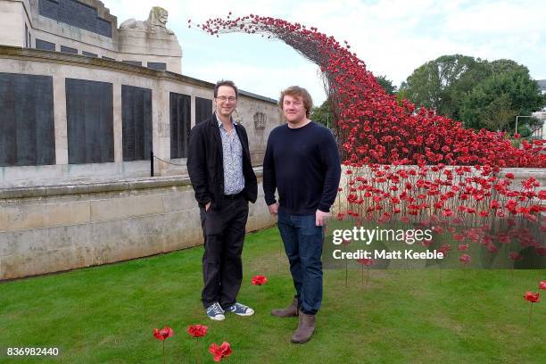 Designer Tom Piper and Artist Paul Cummins attend the poppy sculpture 'Wave' opening at the CWGC Naval Memorial, as part of a UK wide tour organised...