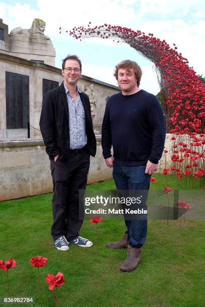 Designer Tom Piper and Artist Paul Cummins attend the poppy sculpture 'Wave' opening at the CWGC Naval Memorial, as part of a UK wide tour organised...