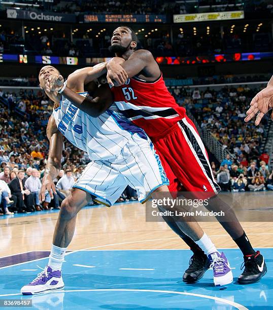 Greg Oden of the Portland Trail Blazers fights for position with Tyson Chandler of the New Orleans Hornets on November 14, 2008 at the New Orleans...