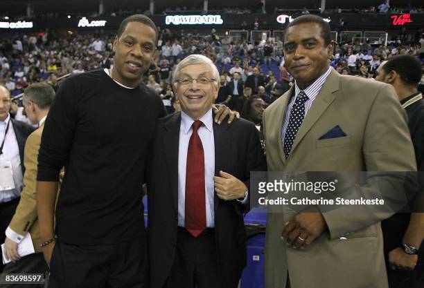 Rapper Jay-Z, NBA Commissioner David Stern and Ahmad Rashad pose for a portrait prior to the game between the New Jersey Nets and the Miami Heat at...