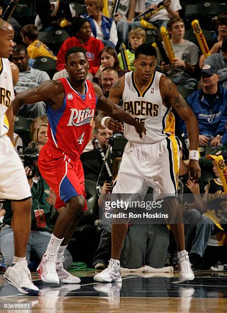 Kareem Rush of the Philadelphia 76ers guards his younger brother, Brandon Rush, #25 of the Indiana Pacers at Conseco Fieldhouse on November 14, 2008...