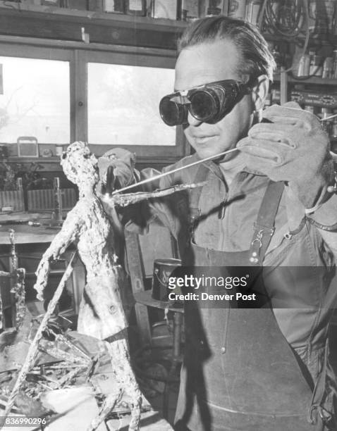 Bernardi, Anthony J. Heavy goggles are required to protect the eyes from the torch flames during the bronze puddling process. Once Bernardi has a...